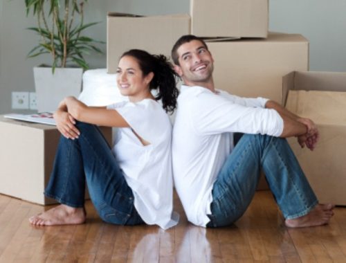 Happy Young Couple Moving House